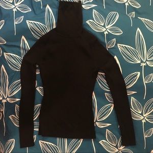 Fitted ribbed merino turtleneck sweater